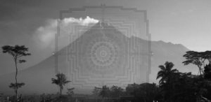 Photograph of the Gunung Merapi Stratovolcano in Indonesia with trees in front of the volcano. 