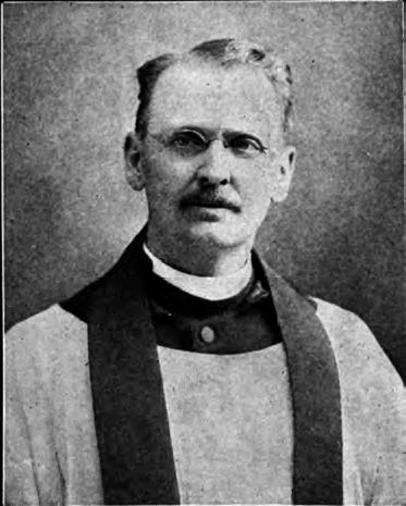 A portrait of a middle aged E. Warren Clark wearing glasses. He is also wearing a clergy outfit. 
