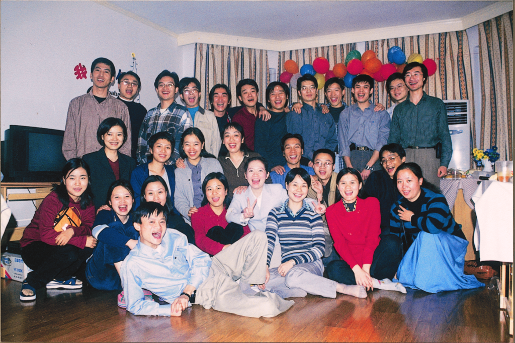 a group of people pose for a photo