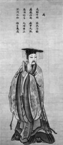illustration of a man in robes on a manuscript