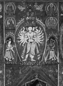 painting of a many-armed figure beind worshipped by several smaller figures