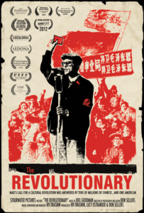 poster for "The Revolutionary" written in large red letters, with an image of a man speaking into a microphone holding a card.