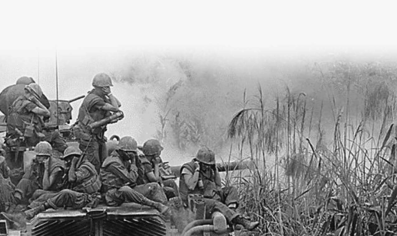black and white photo of man in military uniforms