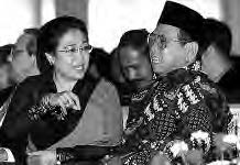 a man and woman speak to each other