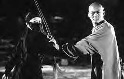 a woman with a sword is stopped by a man who looks out at danger