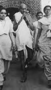 a man and several people with him walk forward