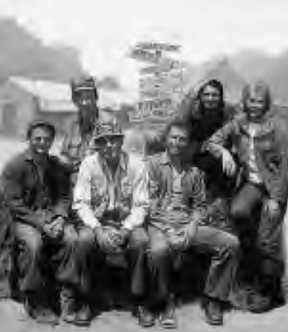 several people pose for a photo