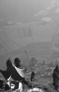 photo of a temple overlooking many fields