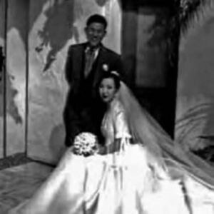 photo of a man and woman in wedding garb