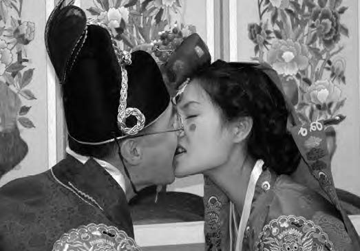 photo of a man and woman kissing