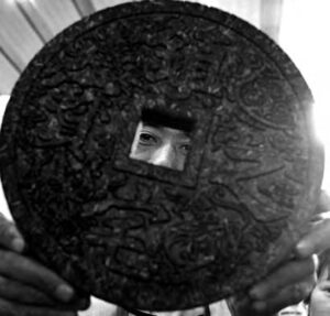 photo of a brick of tea shaped as a coin